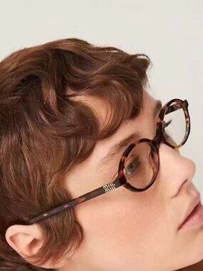 MIUMIU Tortoise Sunglasses